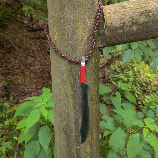 Giant curved sword pendant